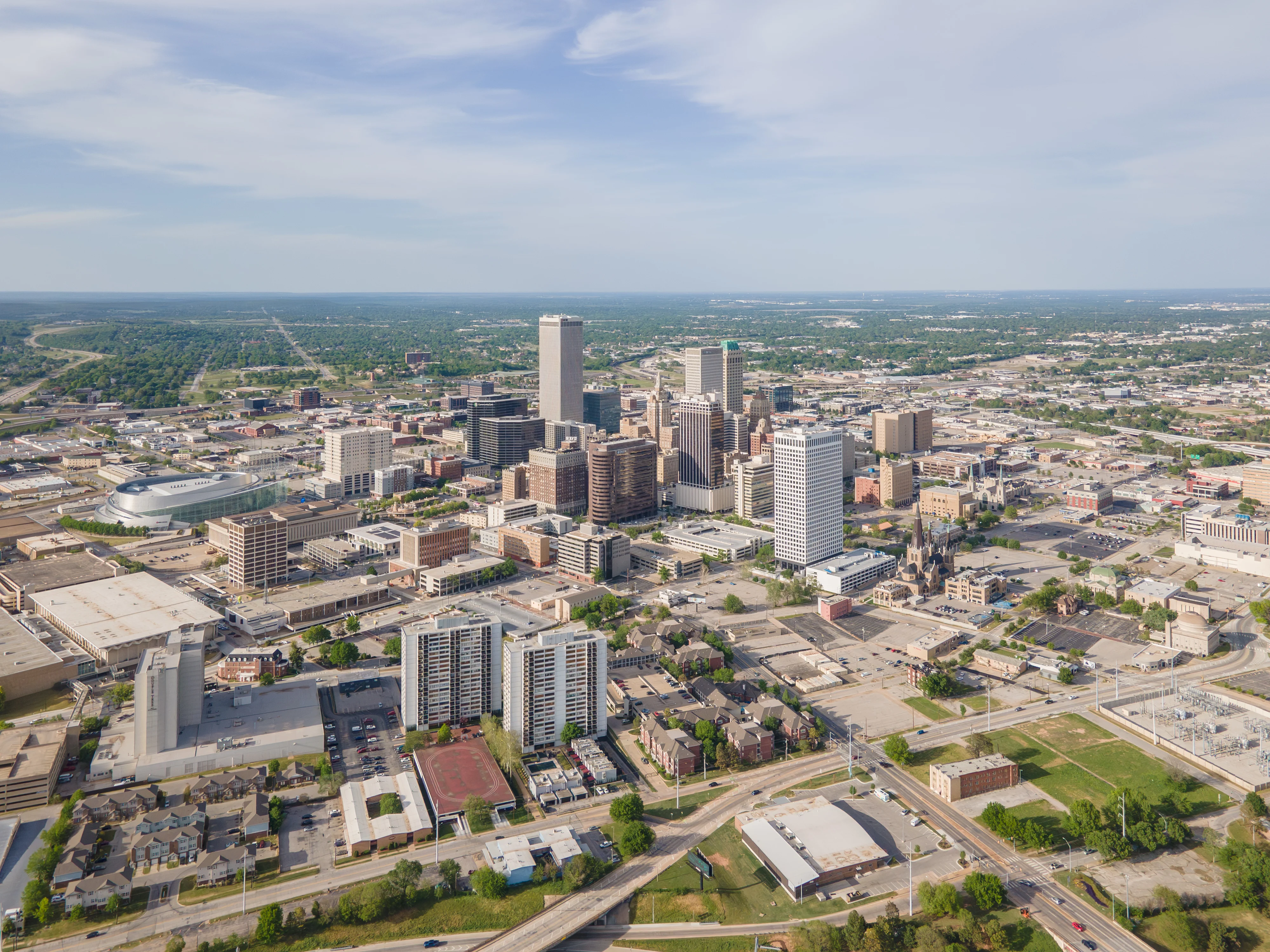 Aerial view Tulsa skyline showing comprehensive coverage area for process serving across all Tulsa neighborhoods and districts